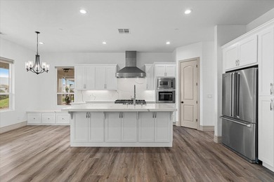 Experience luxury single-story living in this 2,546 sq. ft on The Club at Copper Valley Golf Course in California - for sale on GolfHomes.com, golf home, golf lot