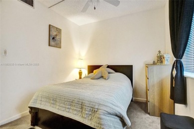 Experience Real South Florida Living in this spacious  2/2 condo on Jacaranda Golf Club in Florida - for sale on GolfHomes.com, golf home, golf lot
