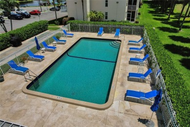 Experience Real South Florida Living in this spacious  2/2 condo on Jacaranda Golf Club in Florida - for sale on GolfHomes.com, golf home, golf lot