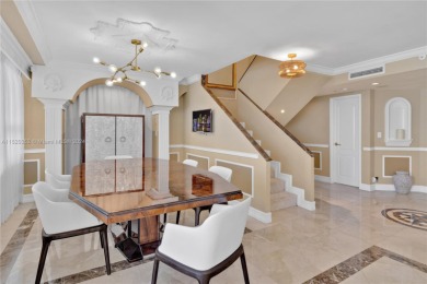 Step into exceptional luxury with this rare 2400 sqft, two-floor on La Gorce Country Club in Florida - for sale on GolfHomes.com, golf home, golf lot