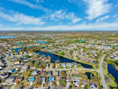 This charming 3-bedroom, 2-bathroom home offers affordability on Summerfield Crossing Golf Club in Florida - for sale on GolfHomes.com, golf home, golf lot