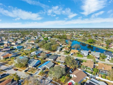 This charming 3-bedroom, 2-bathroom home offers affordability on Summerfield Crossing Golf Club in Florida - for sale on GolfHomes.com, golf home, golf lot