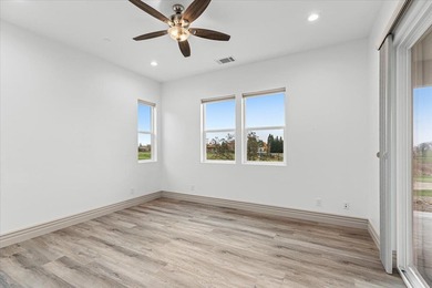 Experience luxury single-story living in this 2,546 sq. ft on The Club at Copper Valley Golf Course in California - for sale on GolfHomes.com, golf home, golf lot