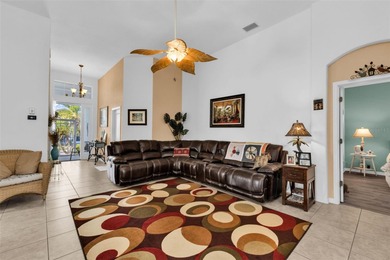 STUNNIG SHEFFIELD with HIGH ceilings in the gated golf on Kings Gate Golf Club in Florida - for sale on GolfHomes.com, golf home, golf lot