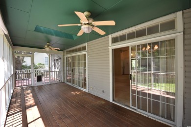 Beach living without the million dollar price tag! One mile from on Pawleys Plantation Golf and Country Club in South Carolina - for sale on GolfHomes.com, golf home, golf lot