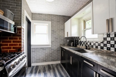 This charming South Side bungalow is full of character and some on Wakonda Club in Iowa - for sale on GolfHomes.com, golf home, golf lot