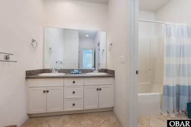 *Seas the day* is a beautifully maintained reverse-floor plan on The Currituck Golf Club in North Carolina - for sale on GolfHomes.com, golf home, golf lot