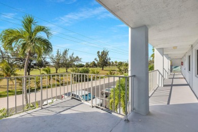 This beautifully updated condo offers full views of Boot Key on Sombrero Golf and Country Club in Florida - for sale on GolfHomes.com, golf home, golf lot