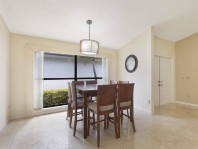 Enjoy the Boca Woods lifestyle in this beautiful Pinewood model on Boca Woods Country Club in Florida - for sale on GolfHomes.com, golf home, golf lot
