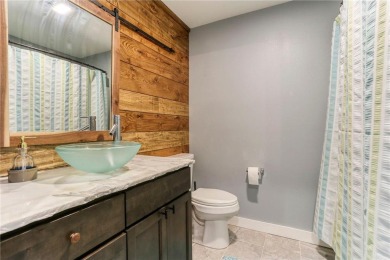 Welcome to this stunning custom-built home nestled in just steps on Pinewood Golf Course in Wisconsin - for sale on GolfHomes.com, golf home, golf lot