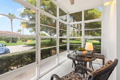 Charming, light-filled 1BR/1.5BA first-floor end unit nestled in on The American Golf Club in Florida - for sale on GolfHomes.com, golf home, golf lot