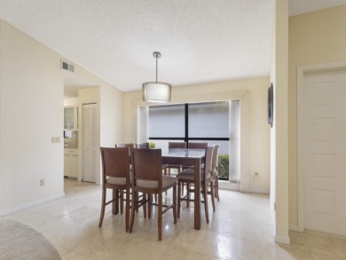 Enjoy the Boca Woods lifestyle in this beautiful Pinewood model on Boca Woods Country Club in Florida - for sale on GolfHomes.com, golf home, golf lot