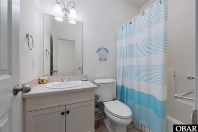 *Seas the day* is a beautifully maintained reverse-floor plan on The Currituck Golf Club in North Carolina - for sale on GolfHomes.com, golf home, golf lot