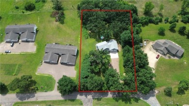 Welcome to this stunning custom-built home nestled in just steps on Pinewood Golf Course in Wisconsin - for sale on GolfHomes.com, golf home, golf lot