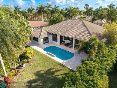 Nestled in the prestigious Weston Hills Community, this on Weston Hills Country Club in Florida - for sale on GolfHomes.com, golf home, golf lot