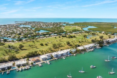 This beautifully updated condo offers full views of Boot Key on Sombrero Golf and Country Club in Florida - for sale on GolfHomes.com, golf home, golf lot