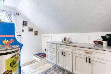 Welcome to this stunning custom-built home nestled in just steps on Pinewood Golf Course in Wisconsin - for sale on GolfHomes.com, golf home, golf lot