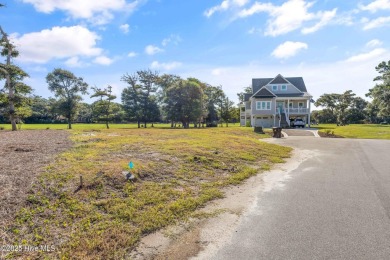 Discover your perfect beach escape in this hidden gem, nestled on Oak Island Golf Club in North Carolina - for sale on GolfHomes.com, golf home, golf lot