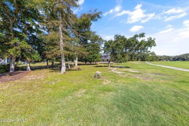 Discover your perfect beach escape in this hidden gem, nestled on Oak Island Golf Club in North Carolina - for sale on GolfHomes.com, golf home, golf lot