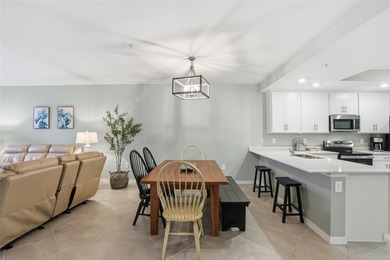 Wake up to shimmering water views and end every day with on Heritage Landing Golf  in Florida - for sale on GolfHomes.com, golf home, golf lot