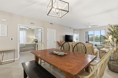 Wake up to shimmering water views and end every day with on Heritage Landing Golf  in Florida - for sale on GolfHomes.com, golf home, golf lot