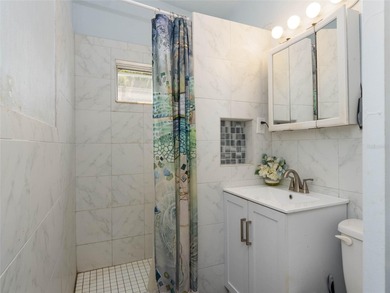 Charming bungalow situated on a quiet street in the heart of on Port Charlotte Golf Club in Florida - for sale on GolfHomes.com, golf home, golf lot