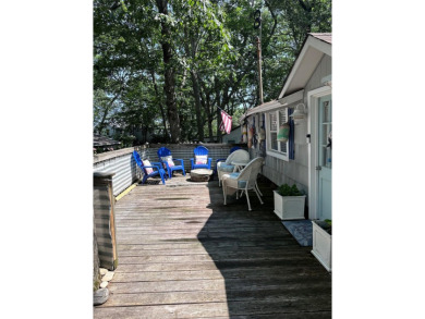 As far as Beach Cottages go this one SCREAMS beach vibes from on Baiting Hollow Club in New York - for sale on GolfHomes.com, golf home, golf lot