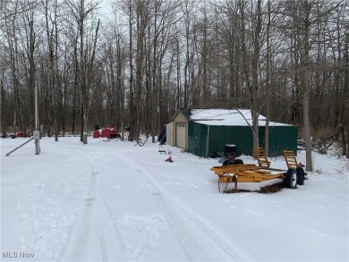 Welcome to this cozy 8 1/2 acre hunter/fishermen retreat located on Andover Golf Course in Ohio - for sale on GolfHomes.com, golf home, golf lot