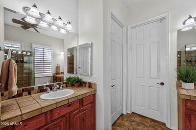 Stunning home, located within the gated Trilogy at Power Ranch on Trilogy Golf Club At Power Ranch in Arizona - for sale on GolfHomes.com, golf home, golf lot