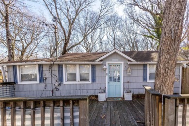 As far as Beach Cottages go this one SCREAMS beach vibes from on Baiting Hollow Club in New York - for sale on GolfHomes.com, golf home, golf lot