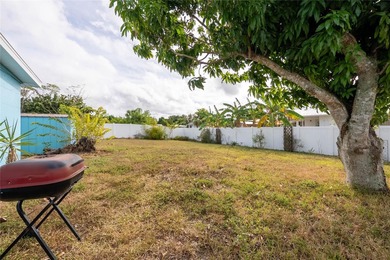 Charming bungalow situated on a quiet street in the heart of on Port Charlotte Golf Club in Florida - for sale on GolfHomes.com, golf home, golf lot