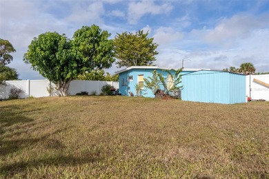 Charming bungalow situated on a quiet street in the heart of on Port Charlotte Golf Club in Florida - for sale on GolfHomes.com, golf home, golf lot