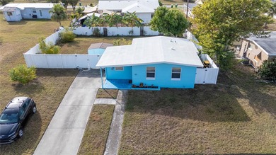 Charming bungalow situated on a quiet street in the heart of on Port Charlotte Golf Club in Florida - for sale on GolfHomes.com, golf home, golf lot