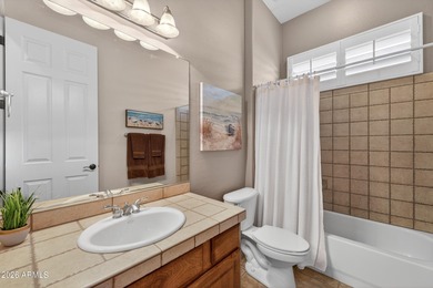 Stunning home, located within the gated Trilogy at Power Ranch on Trilogy Golf Club At Power Ranch in Arizona - for sale on GolfHomes.com, golf home, golf lot