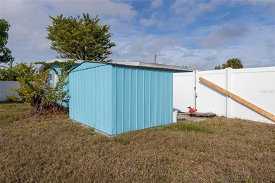 Charming bungalow situated on a quiet street in the heart of on Port Charlotte Golf Club in Florida - for sale on GolfHomes.com, golf home, golf lot