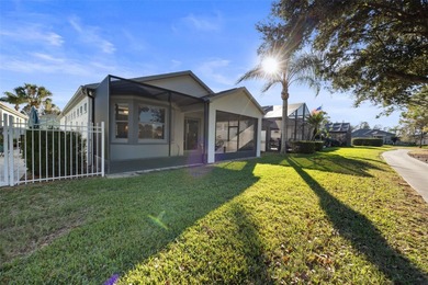 Imagine walking out your back door directly onto the golf course on The Groves Golf and Country Club in Florida - for sale on GolfHomes.com, golf home, golf lot