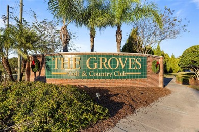 Imagine walking out your back door directly onto the golf course on The Groves Golf and Country Club in Florida - for sale on GolfHomes.com, golf home, golf lot