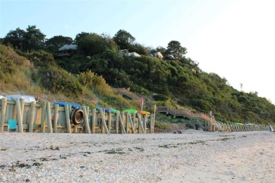 As far as Beach Cottages go this one SCREAMS beach vibes from on Baiting Hollow Club in New York - for sale on GolfHomes.com, golf home, golf lot