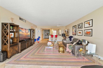 Motivated Seller - Beautifully updated 3/2 corner unit with on Palm-Aire Country Club and Resort - Palms in Florida - for sale on GolfHomes.com, golf home, golf lot