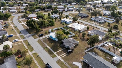 Charming bungalow situated on a quiet street in the heart of on Port Charlotte Golf Club in Florida - for sale on GolfHomes.com, golf home, golf lot