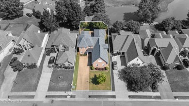This beautifully maintained brick home boasts 4 bedrooms, 3 on Cherokee Valley Golf Course in Mississippi - for sale on GolfHomes.com, golf home, golf lot