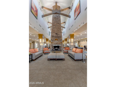 Stunning home, located within the gated Trilogy at Power Ranch on Trilogy Golf Club At Power Ranch in Arizona - for sale on GolfHomes.com, golf home, golf lot