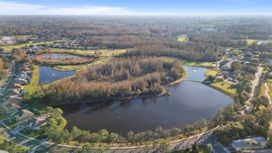 Imagine walking out your back door directly onto the golf course on The Groves Golf and Country Club in Florida - for sale on GolfHomes.com, golf home, golf lot