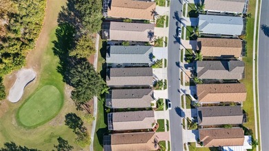 Imagine walking out your back door directly onto the golf course on The Groves Golf and Country Club in Florida - for sale on GolfHomes.com, golf home, golf lot