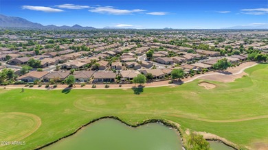 Stunning home, located within the gated Trilogy at Power Ranch on Trilogy Golf Club At Power Ranch in Arizona - for sale on GolfHomes.com, golf home, golf lot