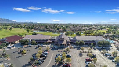 Stunning home, located within the gated Trilogy at Power Ranch on Trilogy Golf Club At Power Ranch in Arizona - for sale on GolfHomes.com, golf home, golf lot