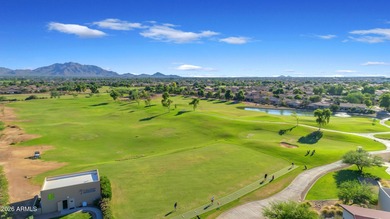 Stunning home, located within the gated Trilogy at Power Ranch on Trilogy Golf Club At Power Ranch in Arizona - for sale on GolfHomes.com, golf home, golf lot