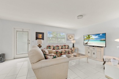 Enjoy lush garden and golf course views from this inviting on Kings Point Golf - Executive in Florida - for sale on GolfHomes.com, golf home, golf lot