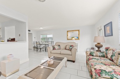 Enjoy lush garden and golf course views from this inviting on Kings Point Golf - Executive in Florida - for sale on GolfHomes.com, golf home, golf lot