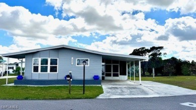 Pack your bags!  This large, corner lot, 2 bedroom & 2 bathroom on Riverbend Golf and Country Club in Florida - for sale on GolfHomes.com, golf home, golf lot